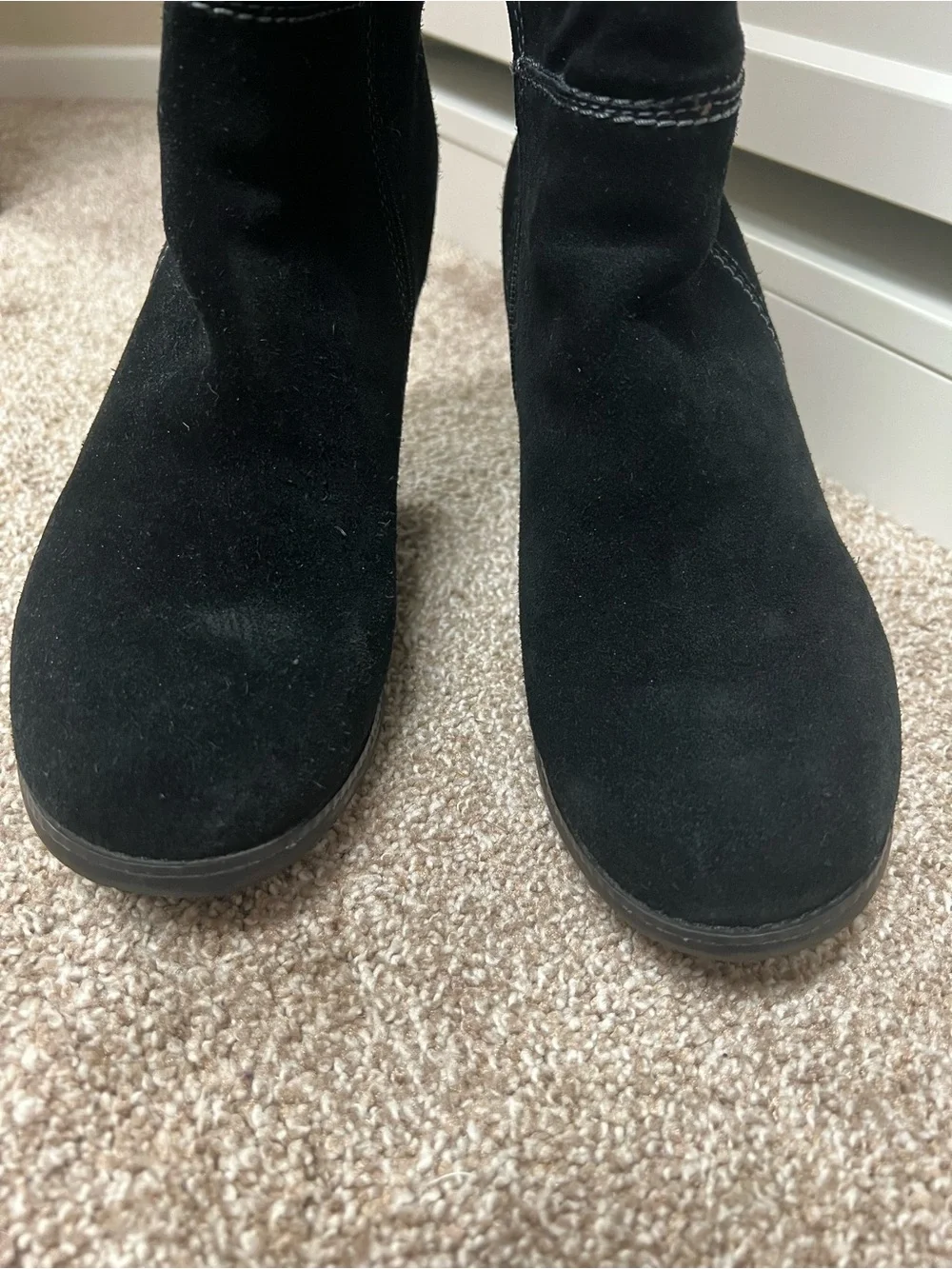 Genuine Stylish black suede knee boots with a comfortable wedge heel.